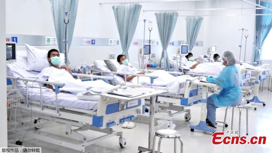 A screen grab shows boys rescued from the Thai cave wearing mask and resting in a hospital in Chiang Rai, Thailand from a July 11, 2018 handout video.  (Photo/Agencies)