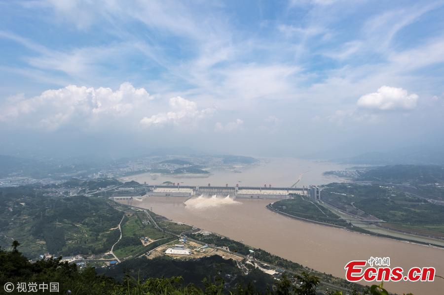 Water gushes out of the Three Gorges Dam in Yichang City, Central China’s Hubei Province. On July 14, the Three Gorges Reservoir will receive a massive 60, 000 cubic meters of water a second due to heavy rain in the upper reaches of the Yangtze River. Authorities have issued a flood alert in several provinces along the river. (Photo/VCG)