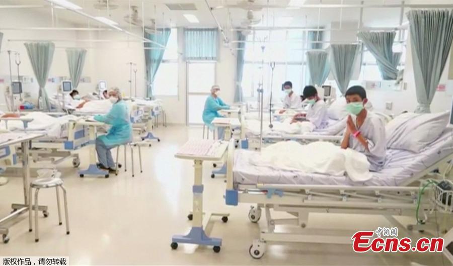 A screen grab shows boys rescued from the Thai cave wearing mask and resting in a hospital in Chiang Rai, Thailand from a July 11, 2018 handout video.  (Photo/Agencies)