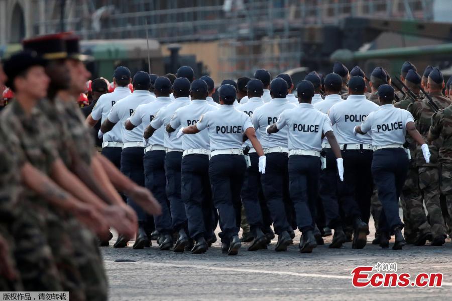 French policemen attend a rehearsal of the Bastille day parade on the Champs-Elysees in Paris, France, July 12, 2018. (Photo/Agencies)