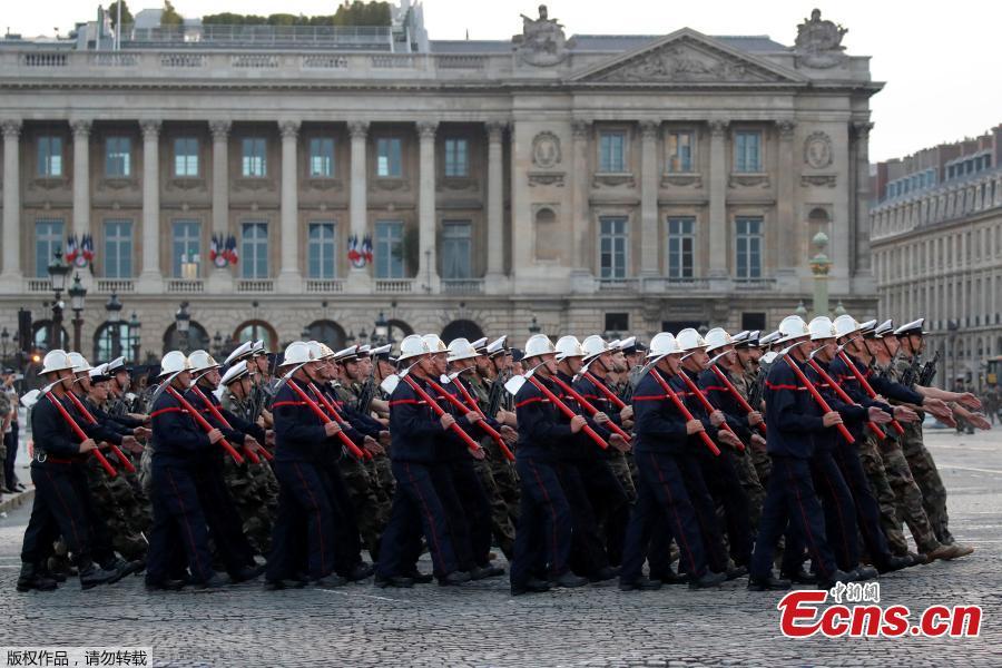 French firefighters and navy soldiers attend a rehearsal of the Bastille day parade on the Champs-Elysees in Paris, France, July 12, 2018. (Photo/Agencies)