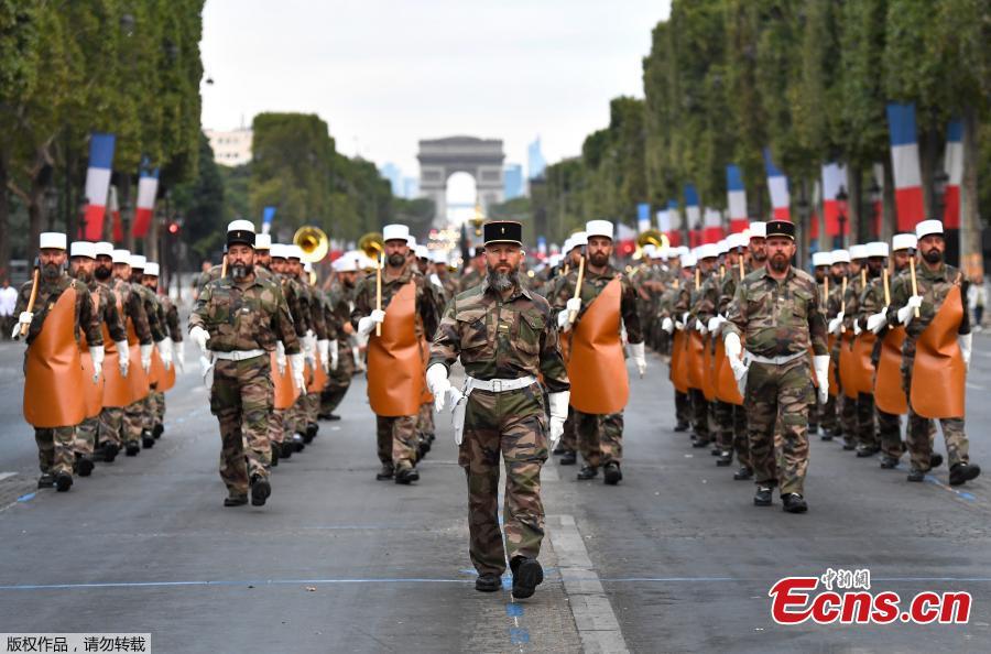 Soldiers of the French Foreign Legion parade on the Champs Elysees avenue during a rehearsal for Bastille Day, early Wednesday, July 11, 2018 in Paris, France. (Photo/Agencies)