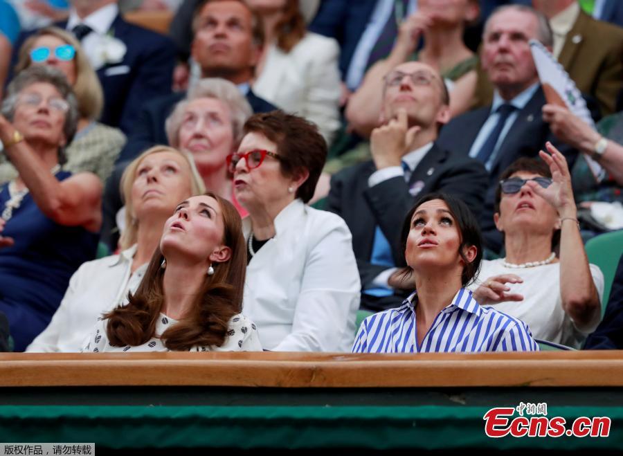 Britain\'s Catherine the Duchess of Cambridge and Meghan the Duchess of Sussex watch Spain\'s Rafael Nadal continue his semi final match against Serbia\'s Novak Djokovic, which was suspended yesterday, after running late, at the Wimbledon Tennis Championships, in London, Britain, July 14, 2018. (Photo/Agencies)