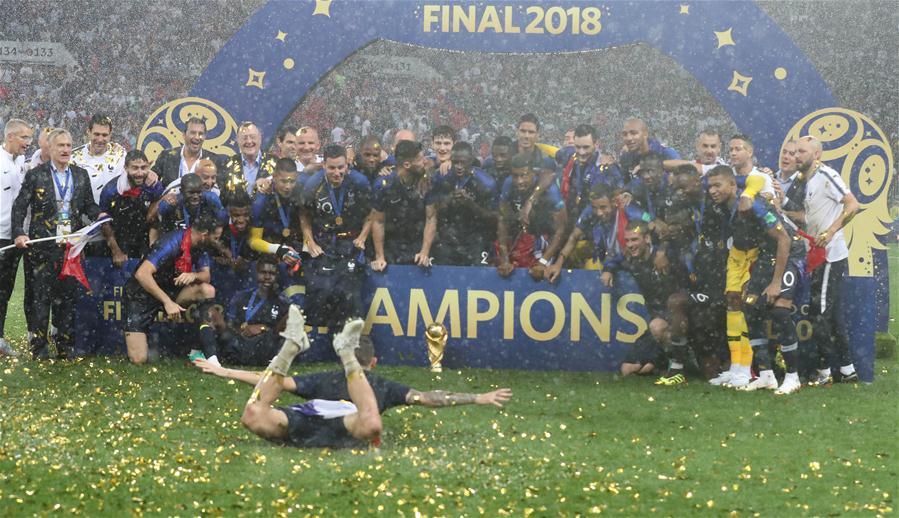 Players of France celebrate at the awarding ceremony after the 2018 FIFA World Cup final match between France and Croatia in Moscow, Russia, July 15, 2018. France defeated Croatia 4-2 and claimed the title. (Xinhua/Cao Can)