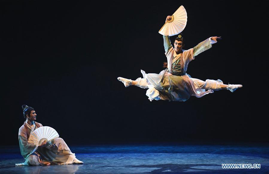 Dancers perform during the 12th National Dance Exhibition in Kunming, capital of southwest China\'s Yunnan Province, July 17, 2018. The exhibition is held here from July 11 to 21. (Xinhua/Lin Yiguang)
