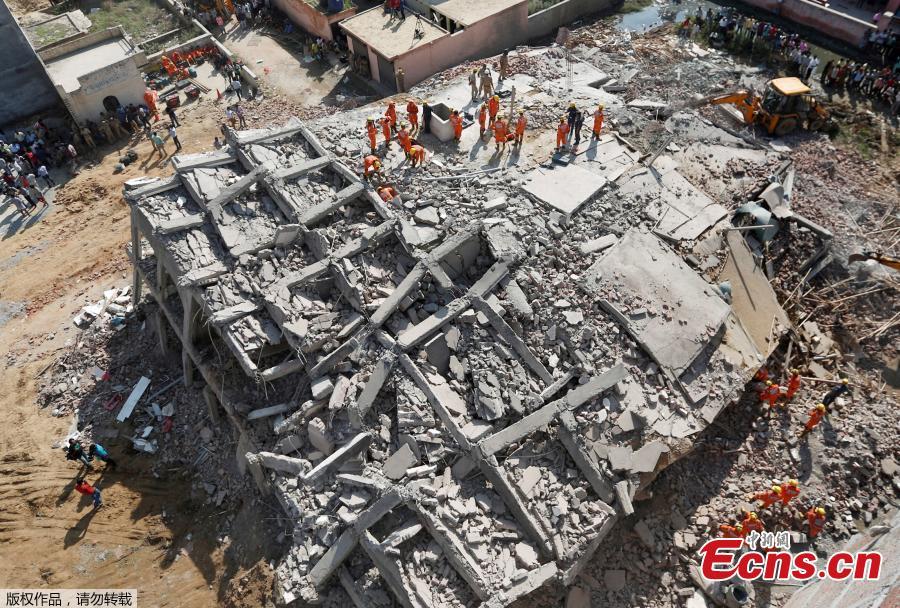 Rescue workers look for survivors amidst the rubble at the site of a collapsed residential building at Shah Beri village in Greater Noida, India, July 18, 2018. Police said that most of the people feared trapped are laborers working at the site. India Today reported that a National Disaster Response Force (NDRF) team has also been rushed to the spot. The news channel further said that as many as 20 people are feared trapped in the debris. (Photo/Agencies)