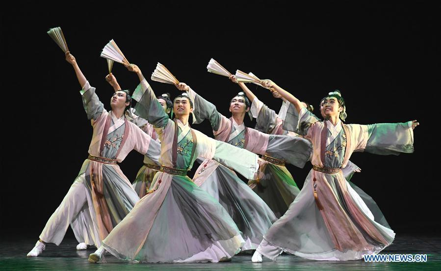 Dancers perform during the 12th National Dance Exhibition in Kunming, capital of southwest China\'s Yunnan Province, July 17, 2018. The exhibition is held here from July 11 to 21. (Xinhua/Lin Yiguang)