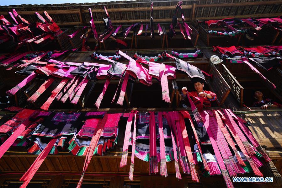 Women of Yao ethnic group present folk costumes in Longji Township of Guilin, south China\'s Guangxi Zhuang Autonomous Region, July 18, 2018. Local people of Yao ethnic group on Wednesday celebrated annual \