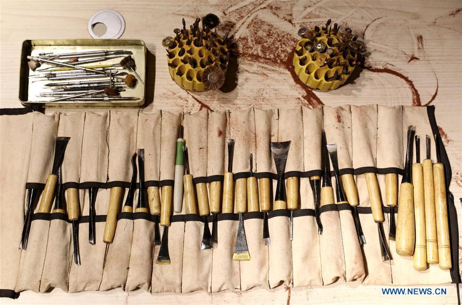 Photo taken on July 20, 2018 shows the tools used by wood carving craftsman Guo Dong in Shijiazhuang, capital of north China\'s Hebei Province. The \