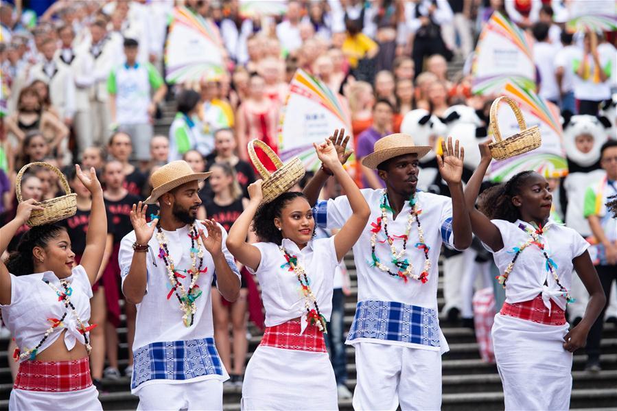 Dancers perform during a parade of an international youth dance festival in Macao, south China, July 21, 2018. A total of 27 dance teams participated in the event here on Saturday. (Xinhua/Cheong Kam Ka)