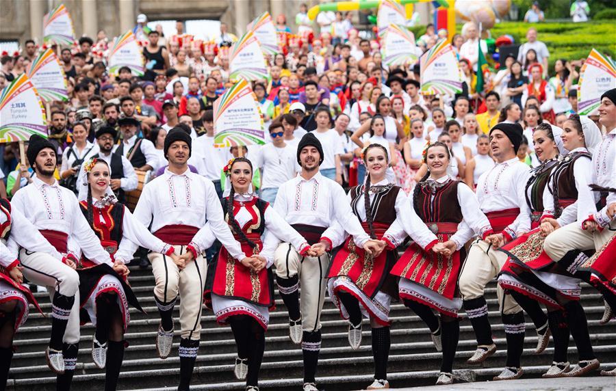 Dancers perform during a parade of an international youth dance festival in Macao, south China, July 21, 2018. A total of 27 dance teams participated in the event here on Saturday. (Xinhua/Cheong Kam Ka)