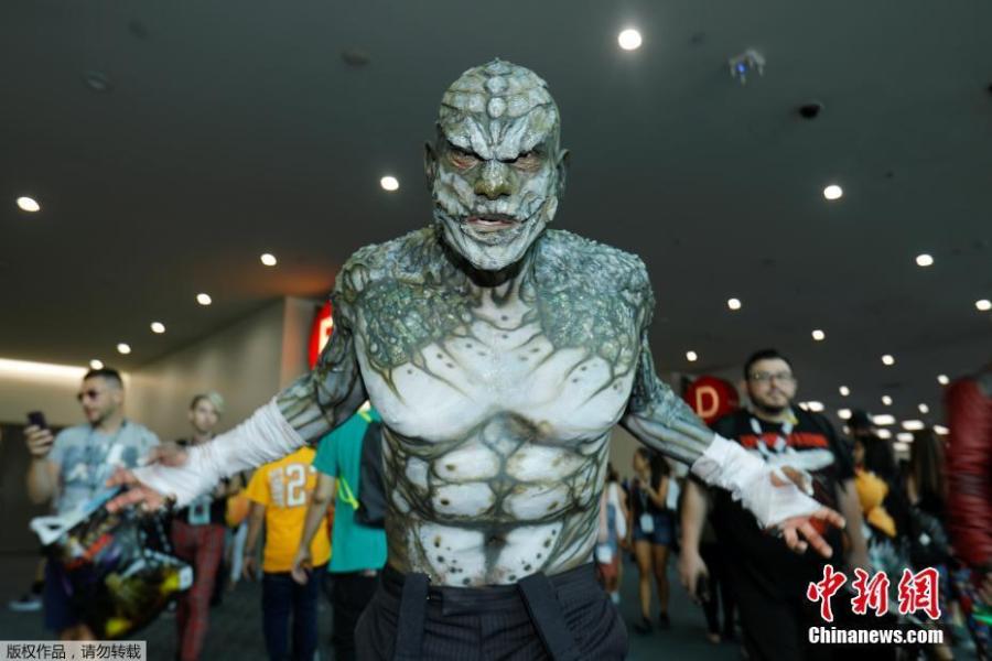 Eli Garcia dressed as the character Killer Croc from the Batman series poses during opening day of pop culture convention Comic-Con in San Diego, California, U.S., July 19, 2018. (Photo/Agencies)