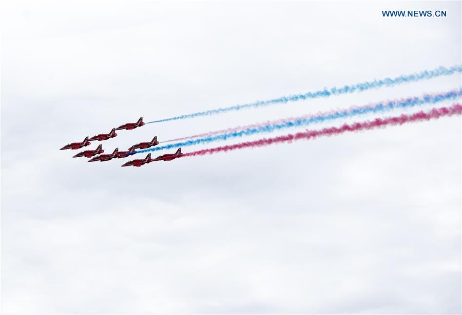 The Red Arrows perform a flypast at the Farnborough International Airshow, south west of London, Britain on July 22, 2018. (Xinhua/Han Yan)
