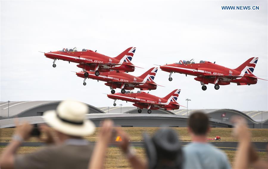 The Red Arrows perform a flypast at the Farnborough International Airshow, south west of London, Britain on July 22, 2018. (Xinhua/Han Yan)