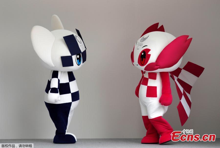 Tokyo 2020 Olympic Games mascot Miraitowa and Paralympic mascot Someity  stand on stage during the mascots\' debut in Tokyo, Japan, July 22, 2018. (Photo/Agencies)