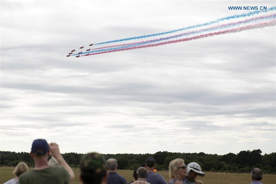 The Red Arrows perform a flypast at the Farnborough International Airshow, south west of London, Britain on July 22, 2018. (Xinhua/Han Yan)