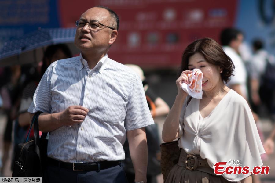 The temperature rose to a record 41.1 Celsius (106 Fahrenheit) in a city northwest of Tokyo on Monday, as a heat wave in Japan that has killed at least 23 people and sent thousands to hospital showed no sign of significant easing. (Photo/Agencies)