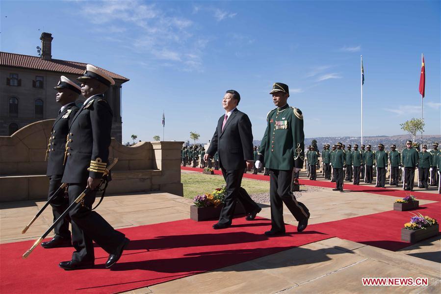 Chinese President Xi Jinping attends a welcoming ceremony held by his South African counterpart Cyril Ramaphosa ahead of their talks in Pretoria, South Africa, July 24, 2018. (Xinhua/Li Tao)