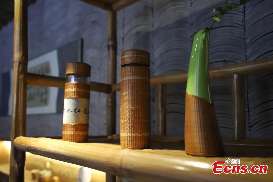 Bamboo weaving works are on display in Datong Ancient Town in Chishui City, Southwest China’s Guizhou Province, July 24, 2018. The town has made efforts to creatively develop traditional handicrafts including bamboo weaving and oil-paper umbrella, which help lift locals out of poverty. (Photo: China News Service/Qu Honglun)