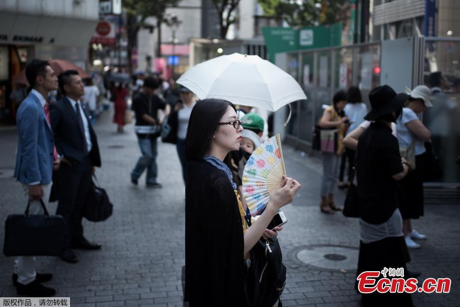 The temperature rose to a record 41.1 Celsius (106 Fahrenheit) in a city northwest of Tokyo on Monday, as a heat wave in Japan that has killed at least 23 people and sent thousands to hospital showed no sign of significant easing. (Photo/Agencies)