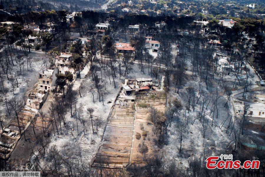 Burnt houses are seen following a wildfire at the village of Mati, near Athens, Greece, July 25, 2018. (Photo/Agencies)