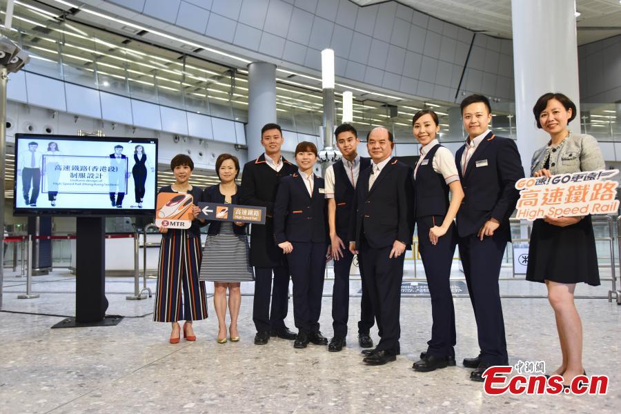 Photo taken on July 26, 2018 shows staff members in their new uniforms at the West Kowloon Station of the Guangzhou-Shenzhen-Hong Kong Express Rail Link that will open in September. The Hong Kong section of the Express Rail Link runs from the station in West Kowloon north to the Shenzhen-Hong Kong border, where it connects with the mainland section. (Photo: China News Service/Sheung Man Mak)