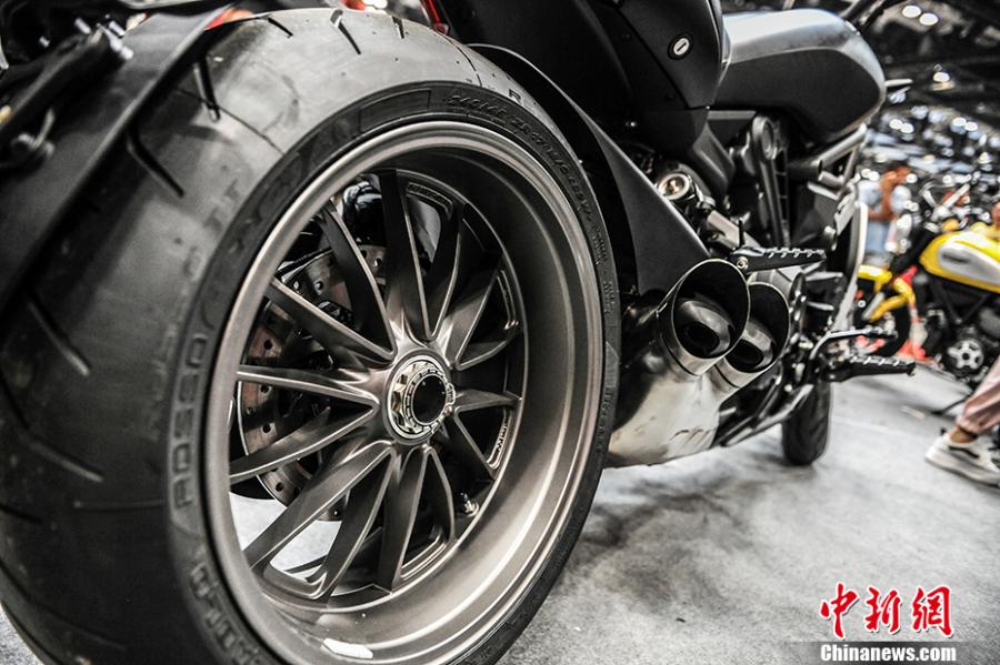 Photo taken on July 28- 29, 2018 shows a motorcycle exhibition held at the China National Convention Center in Beijing. Organized by an online auto platform, the fair displayed hundreds of motorcycles from home and abroad, such as the Ducati 959 sport bike, vintage Changjiang 650 sidecar, the Harley-Davidson WLA produced to the U.S. Army during the World War II and Benelli Leoncino bike. (Photo: China News Service/Fu Yu)