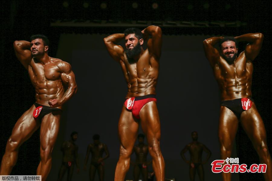 Kashmiri bodybuilders display their muscles at a bodybuilding competition in Srinagar, Indian controlled Kashmir, July 28, 2018. Dozens participated in the competition to choose Mr. Kashmir on Saturday. (Photo/Agencies)