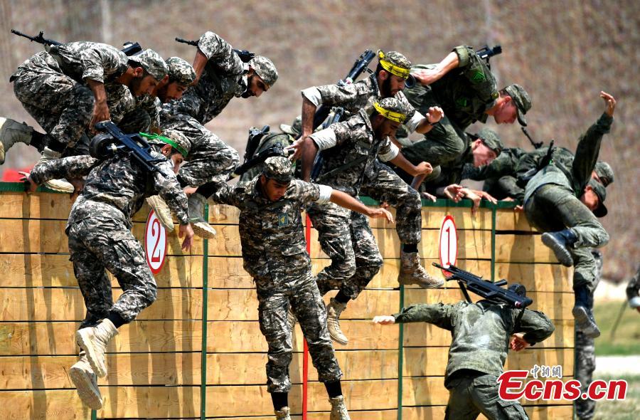 Iranian and Russian soldiers participate in the \