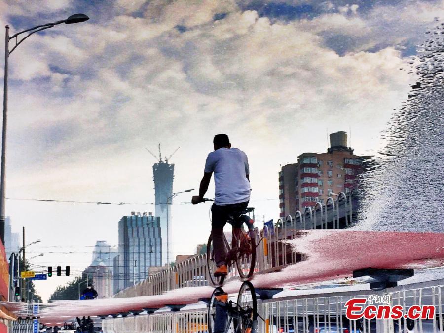 ‘Road to the Future,’ photo by Shuijingdoujiao.
Twenty winning photos in the first stage of a contest to mark the 40th anniversary of China’s reform and opening-up, guided by the Central Cyberspace Affairs Commission and organized by China News Service and its online photo section.