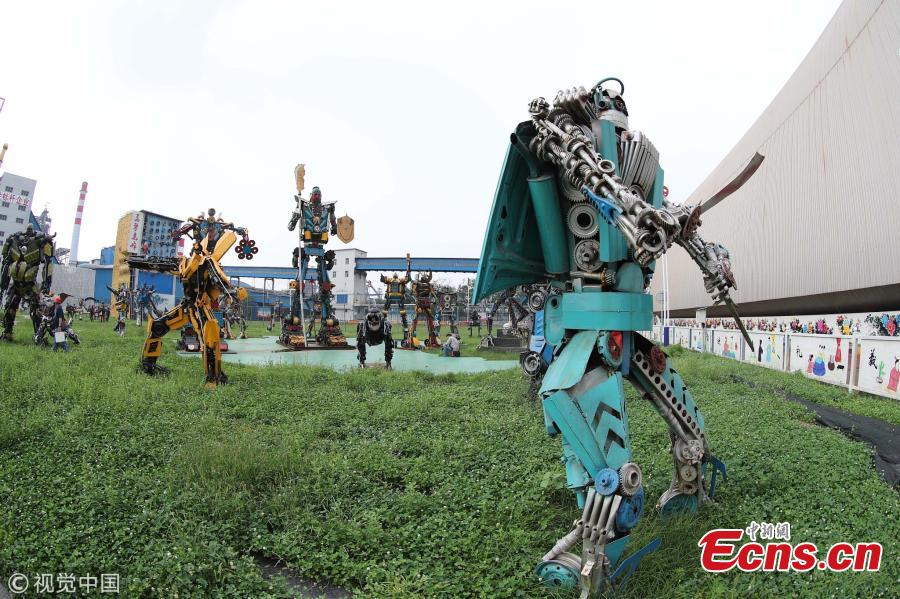 Transformer models made of steel are on display in a steel company in Xingtai City, North China’s Hebei Province, Aug. 1, 2018. The company’s park has 215 robot models of various styles and sizes, from 10.8 to 1.2 meters tall. Some weigh 25 kilograms and others, 11 tons. All the robot models were made by the company’s employees out of used components. The London-based World Record Certification said the company has the world’s largest collection of robot models. (Photo/VCG)