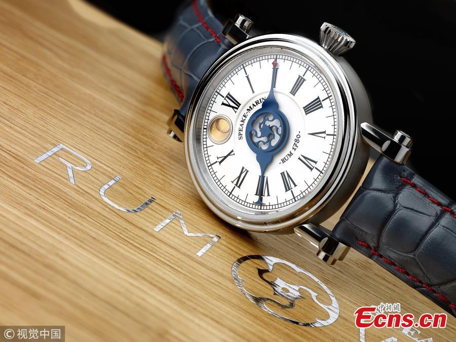 The limited edition Speake-Marin titanium timepiece includes a vial of Harewood Rum which was distilled in 1780. The unique Swiss watch, which was one of only 49 made, was sold for a total of 14,674 pound at Birmingham\'s Fellows Auctioneers on July 31, 2018. (Photo/VCG)