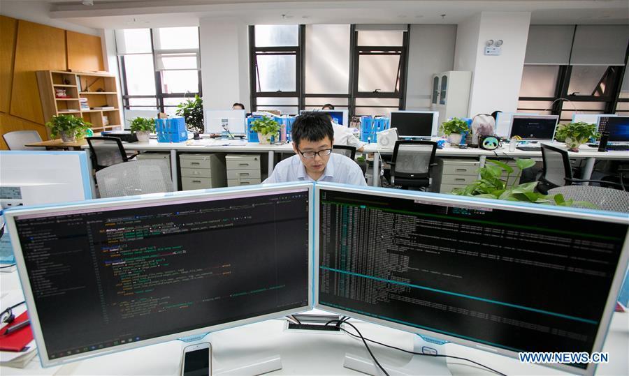 A staff member of BBD (Business Big Data) processes data in Guiyang, capital of southwest China\'s Guizhou Province, Aug. 2, 2018. BBD is a provider of big data solutions. Guizhou has become a pioneer in China\'s big data development. Big data is being widely applied in government management, business and daily life, contributing over 20 percent to the economic growth of Guizhou Province. The number of big data-related companies in Guizhou Province has grown from less than 1,000 in 2013 to more than 8,500 in 2018.(Xinhua/Li Jing)