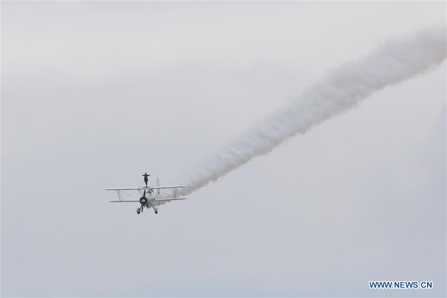 Aerobatic aircraft from Britain perform during Huangguoshu Waterfalls Flight Conference in Anshun, southwest China\'s Guizhou Province, Aug. 3, 2018. (Xinhua/Liu Xu)