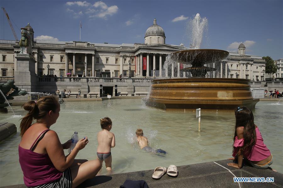 Children play at a fountain at Trafalgar Square in London, Britain, on Aug. 3, 2018. Britain is currently experiencing high temperatures as a heatwave continues across Europe. (Xinhua/Tim Ireland)