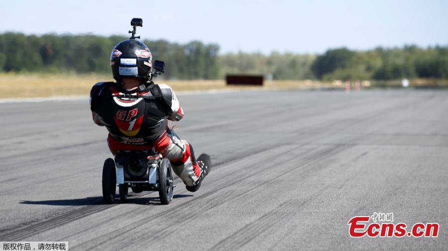 German extreme athlete Dirk Auer drives on his jet-powered Bobby car to set a new world record at 119.68 km/h during an airport racing event in Bottrop-Kirchhellen, western Germany, Aug. 5, 2018. (Photo/Agencies)