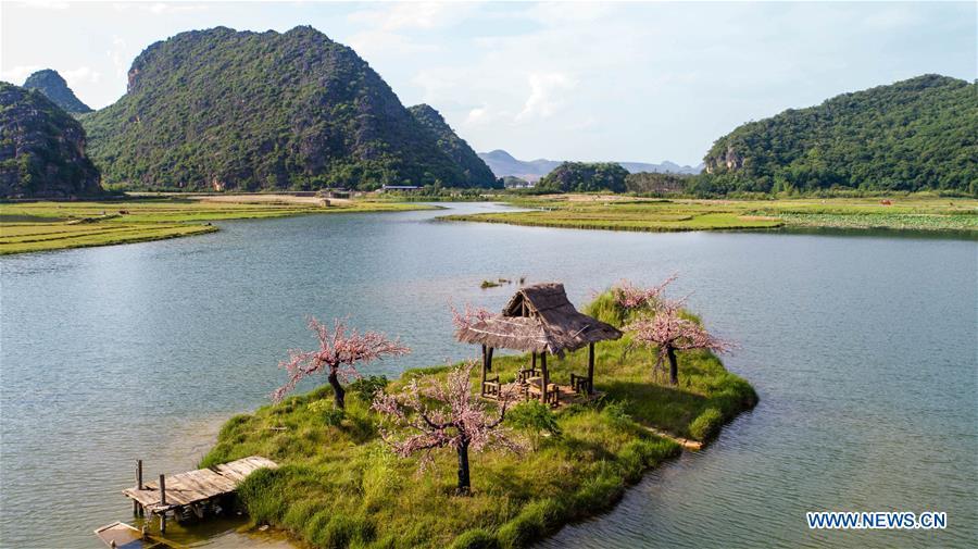 Photo taken on May 26, 2017 shows an aerial view of the Puzhehei state wetland park in Qiubei County, southwest China\'s Yunnan Province. (Xinhua/Hu Chao)