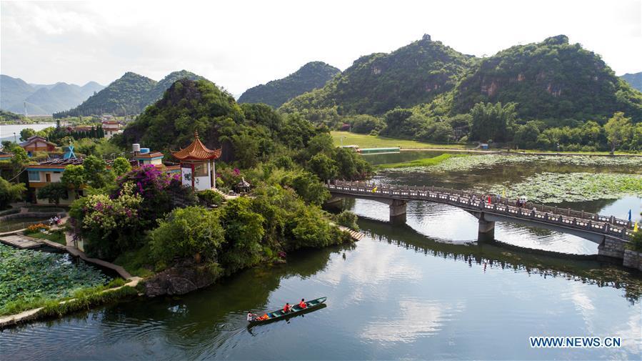 Photo taken on May 26, 2017 shows an aerial view of the Puzhehei state wetland park in Qiubei County, southwest China\'s Yunnan Province. (Xinhua/Hu Chao)