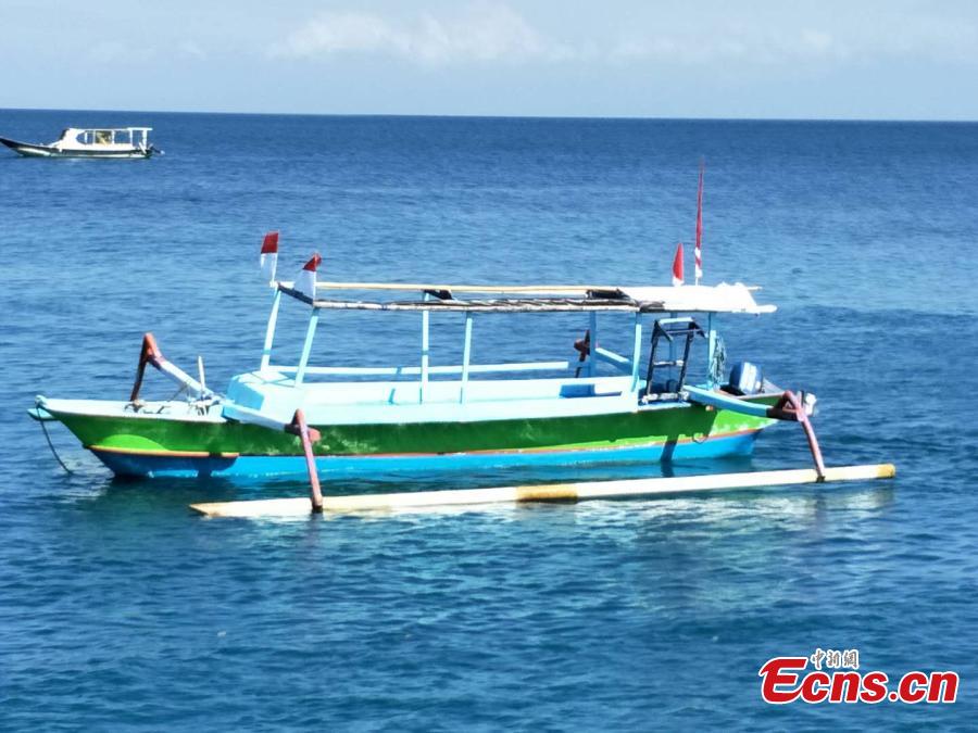 Photo taken on Aug. 7 shows an empty boat on the Lombok Island, Indonesia after a 7.0-magnitude earthquake hit the island on Aug. 5, 2018. (Photo: China News Servie/Lin Yongchuan)