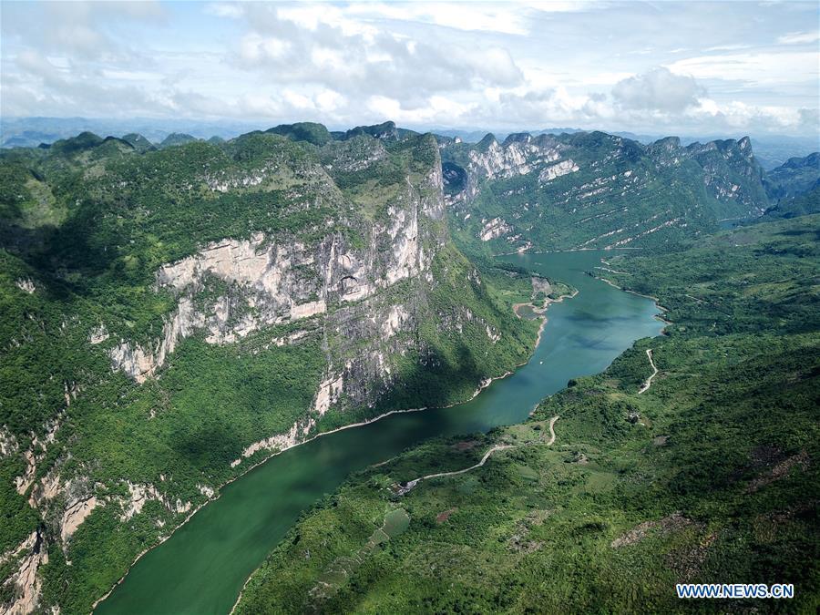 Aerial photo taken on Aug. 7, 2018 shows the scenery of Beipanjiang river valley in Zhenfeng County, southwest China\'s Guizhou Province. (Xinhua/Tao Liang)