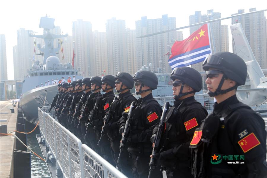 Chinese sailors aboard a ship of the 30th Chinese naval escort taskforce man the rails when the taskforce departs from a naval port in Qingdao of east China\'s Shandong Province on August 6, 2018. (Photo/81.cn)