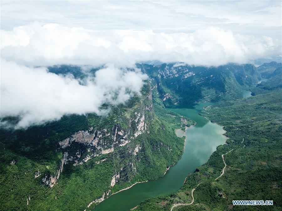 Aerial photo taken on Aug. 7, 2018 shows the scenery of Beipanjiang river valley in Zhenfeng County, southwest China\'s Guizhou Province. (Xinhua/Tao Liang)