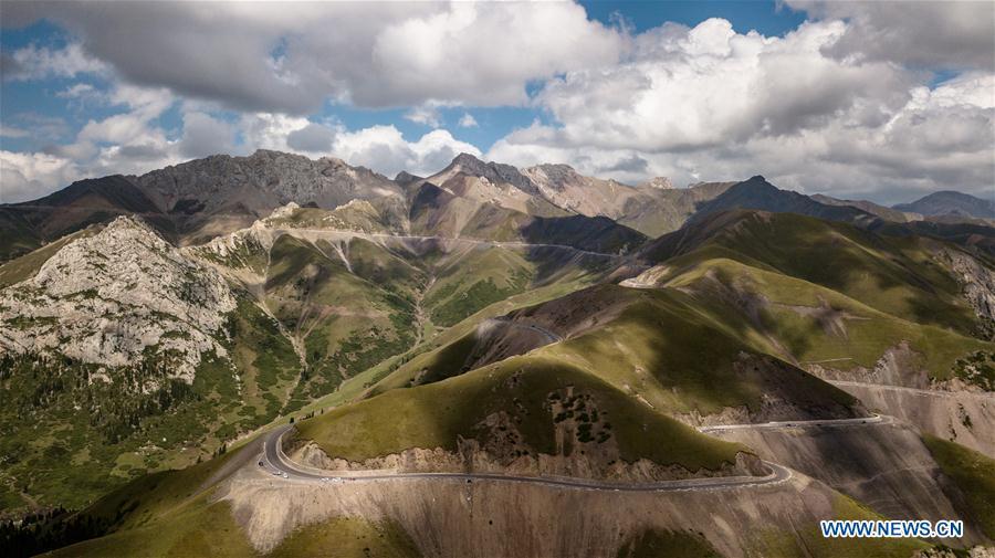 Aerial photo taken on Aug. 8, 2018 shows the Yining-Zhaosu highway in northwest China\'s Xinjiang Uygur Autonomous Region. As an important link of the Silk Road Economic Belt, Xinjiang is speeding up the development of transportation and logistics to connect east and west. By the end of 2017, the total length of roads in Xinjiang reached 186,000 km, with 4,578 km of expressways. (Xinhua/Yang Guang)