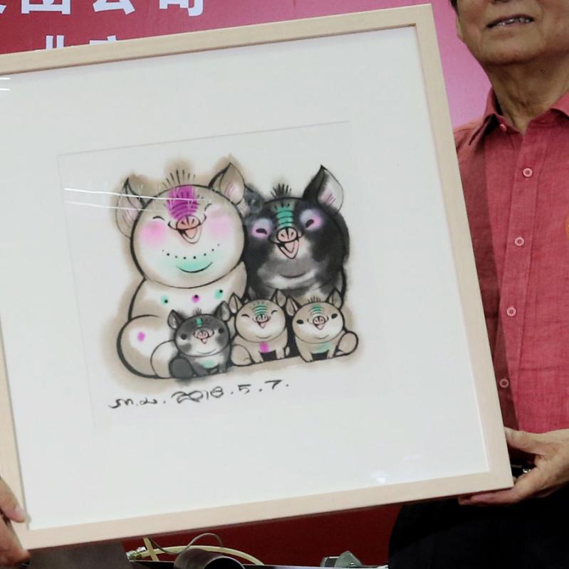 One of the two Year of Pig stamps designed by Han Meilin.  (Photo/China Daily)