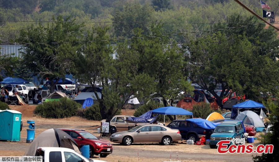 Evacuees from the Ranch Fire and River Fire (Mendocino Complex) are living in motor homes, cars and tents in the parking lot of the Moose Lodge in Clearlake Oaks, California, U.S., Aug. 2, 2018. (Photo/Agencies)