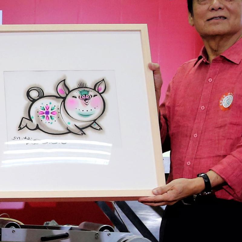 One of the two Year of Pig stamps designed by Han Meilin.  (Photo/China Daily)
