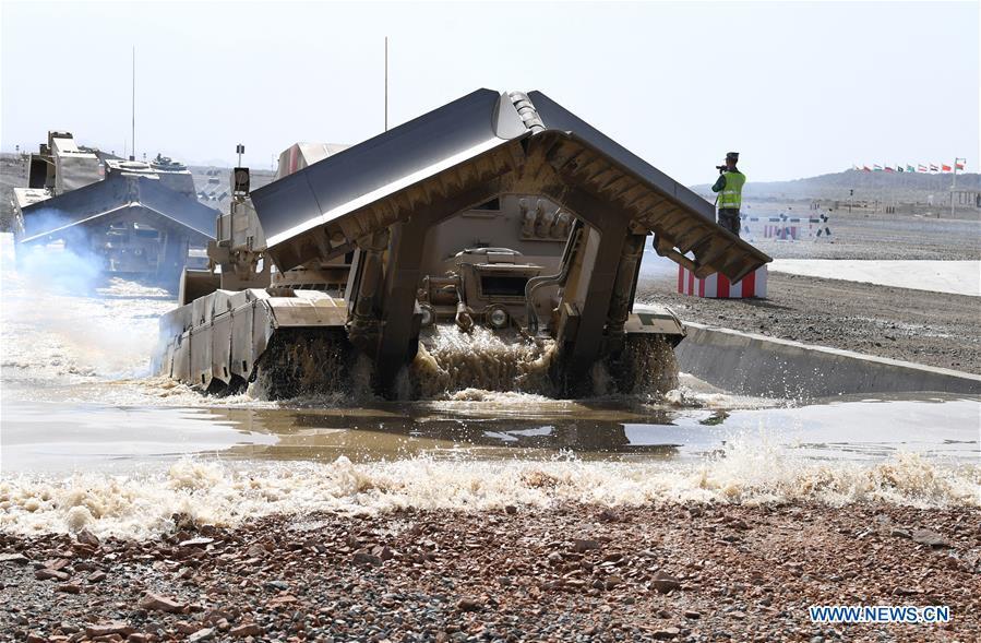 A vehicle operated by a Chinese crew drives through a shoal during a match of the International Army Games 2018 in Korla, northwest China\'s Xinjiang Uygur Autonomous Region, Aug. 8, 2018. Three contests of the International Army Games 2018 in northwest China\'s Xinjiang Uygur Autonomous Region ended here Wednesday. (Xinhua/Zhang Yongjin)