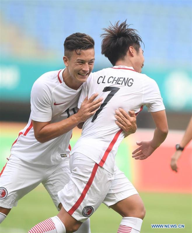 Cheng Chin Lung (R) of Hong Kong of China celebrates scoring with teammates during the Men\'s Football Group A match between Hong Kong of China and Laos at the 18th Asian Games at Patriot Stadium in Bekasi, Indonesia, Aug. 10, 2018. (Xinhua/Jia Yuchen)