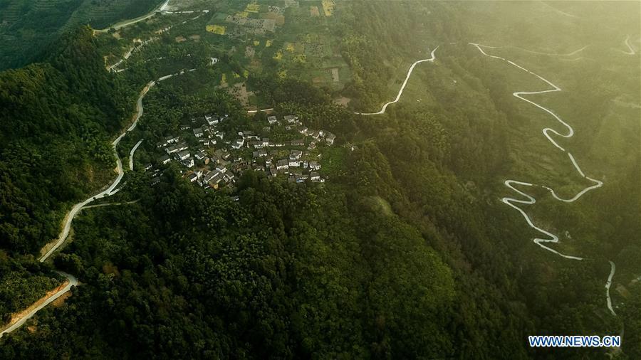 Aerial photo taken on Aug. 10, 2018 shows scenery at dawn in Shitan Village, Shexian County, east China\'s Anhui Province. (Xinhua/Zhang Duan)