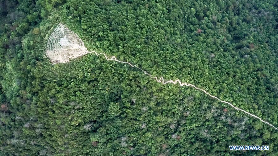 Aerial photo taken on Aug. 10, 2018 shows a pavilion in Shitan Village, Shexian County, east China\'s Anhui Province. (Xinhua/Zhang Duan)